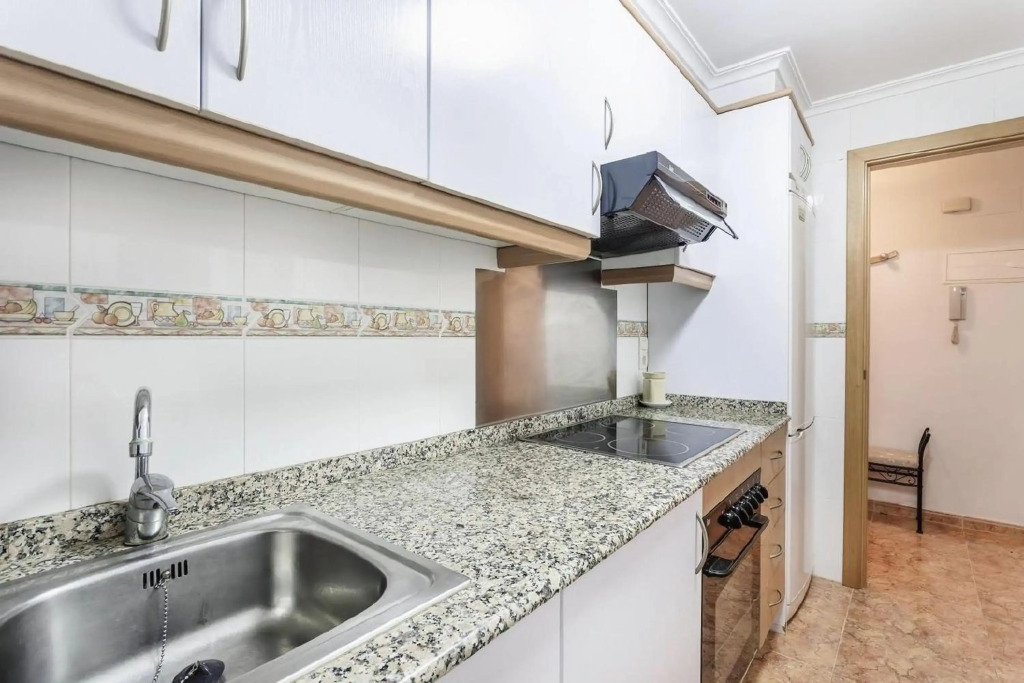 Apartamento con terraza y piscina