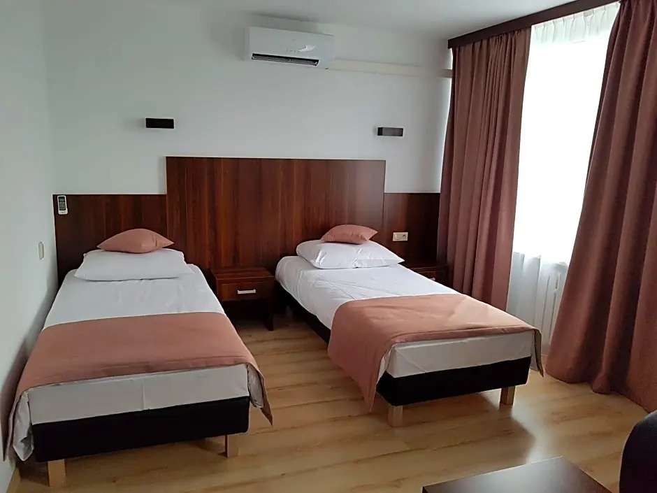 Pod Kominem Pokoje i Apartamenty