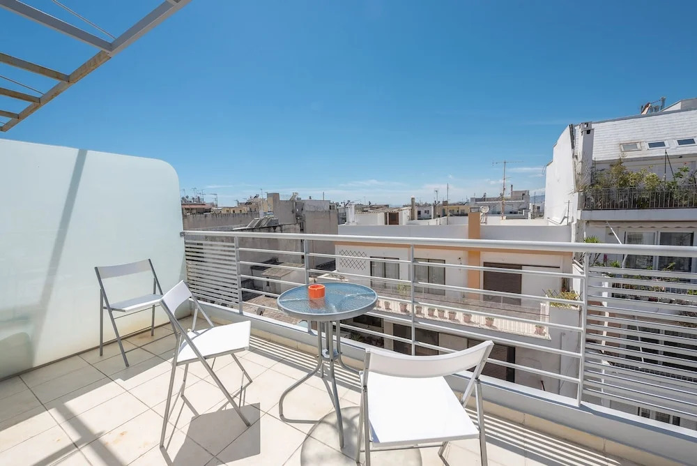 Modern Loft with Acropolis View by Cloudkeys