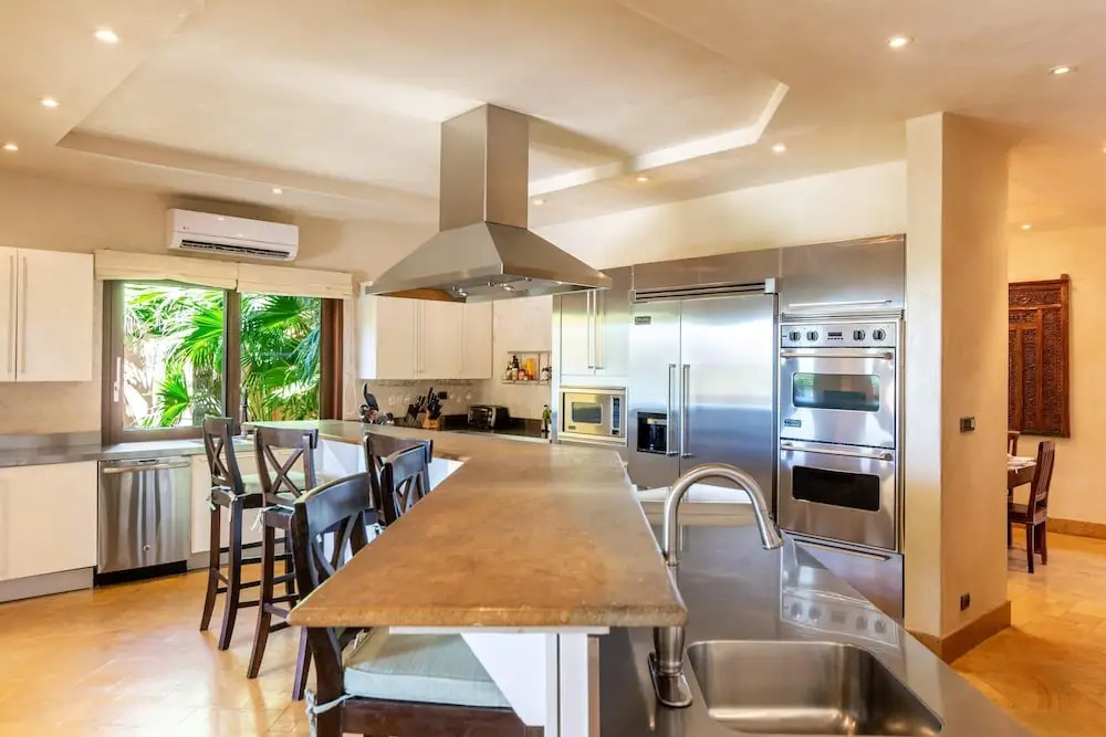 Elegant Mediterranean-Style Mansion with Beachfront Views and Private Infinity Pool