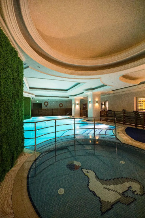 Magnum Hotel & Suites West Bay