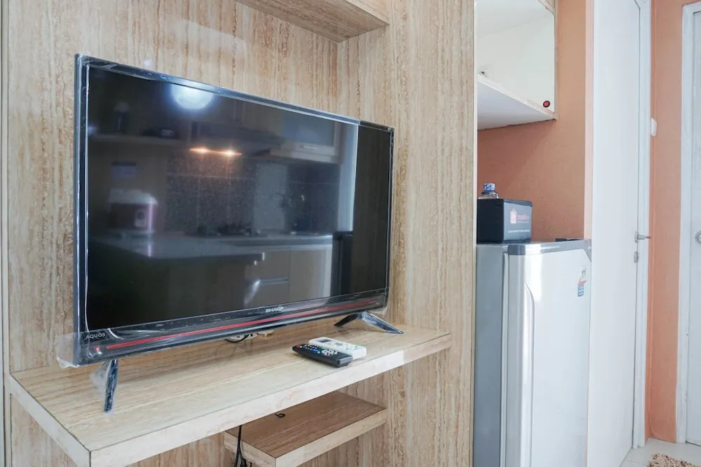 Homey and Fresh 2BR Green Pramuka Apartment