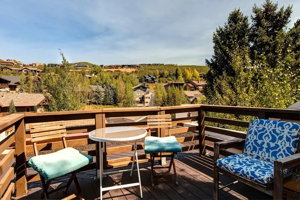 Rooftop Deck with Dowtown Views by RedAwning