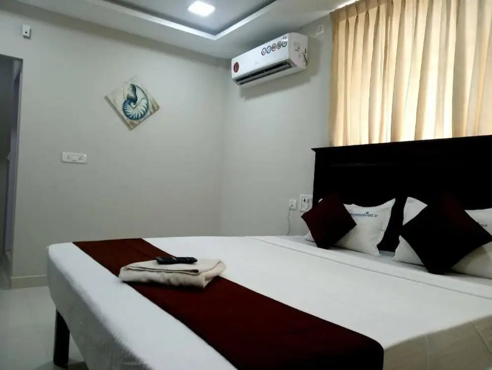 Rithikha Inn crest