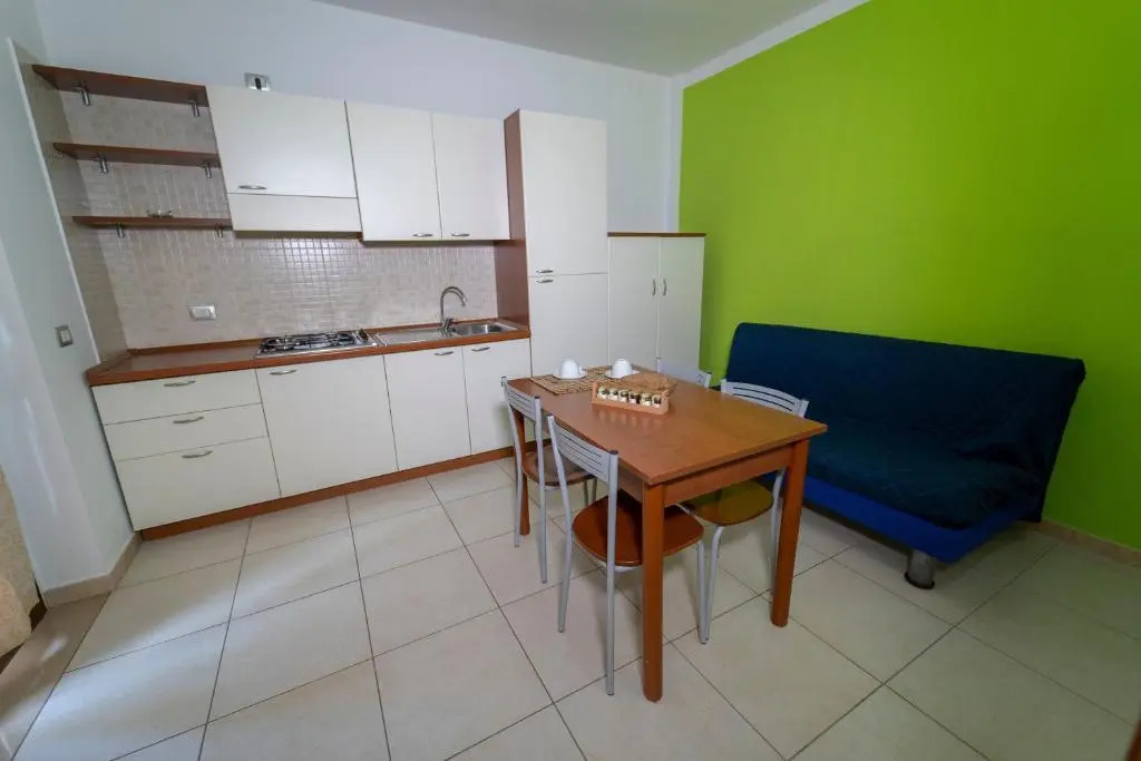 Apartment ulivo with pool and private beach
