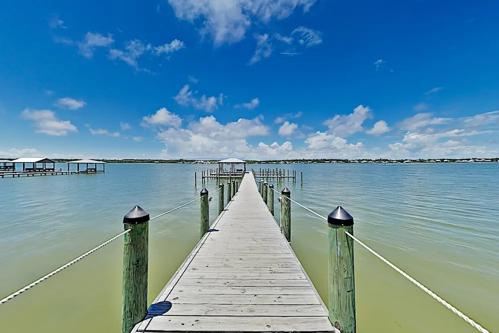 All-suite Laguna Paradise W/ Pool, Dock & Pier 2 Bedroom Townhouse