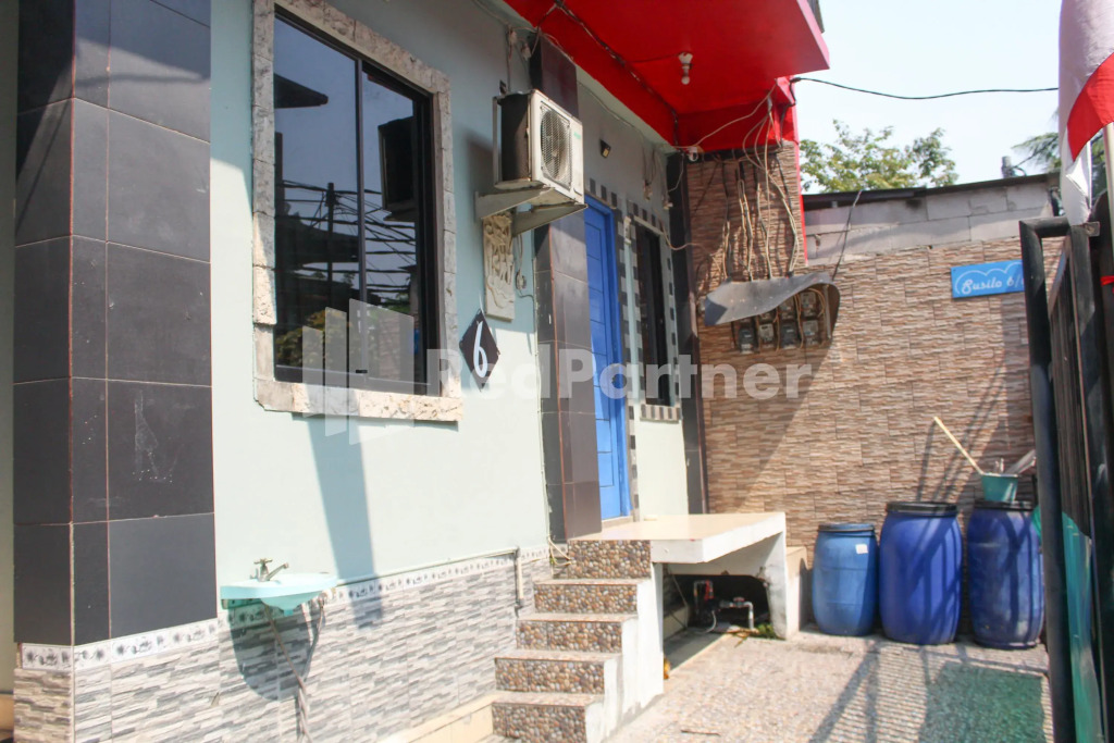 Snow White Residence near Grogol Mitra RedDoorz
