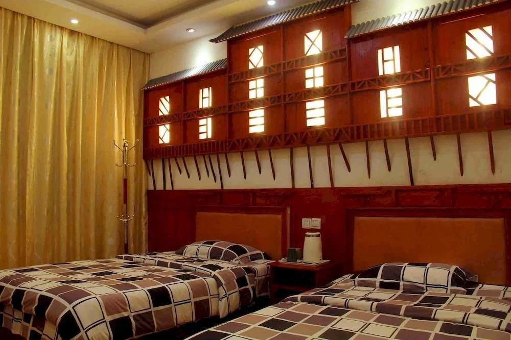 Happy Utopia B&B (Fenghuang Ancient City Nanhua Branch)