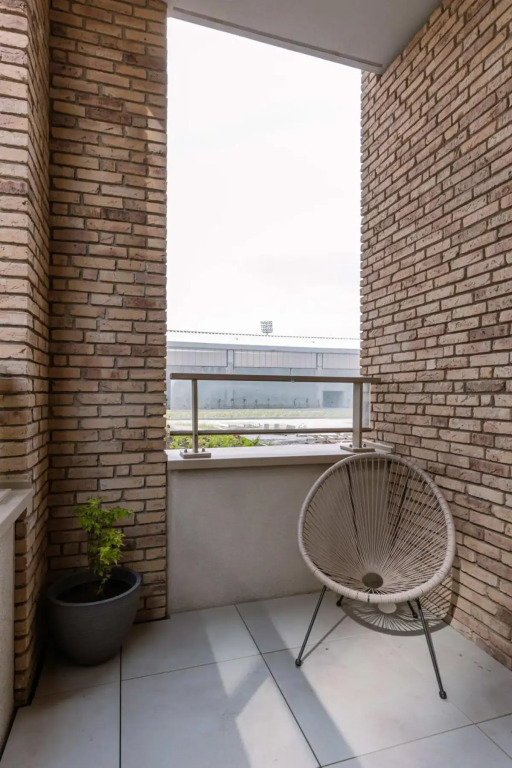 Top of the line apartment in a new upscale residence close to the sea and the beach