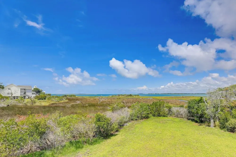 Waterfront Home w/ Screened Porch & Sunsets
