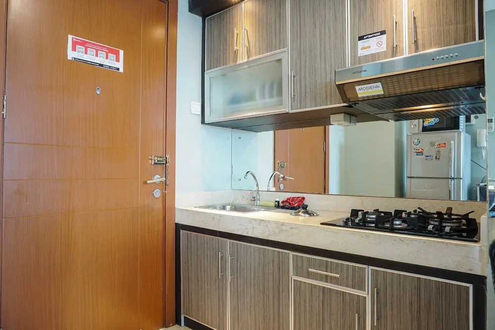 Best Location and Cozy 2BR The H Residence Apartment By Travelio