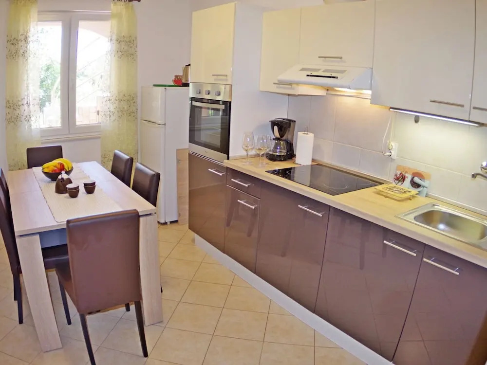 Comfortable apartment with covered  terrace and fenced garden