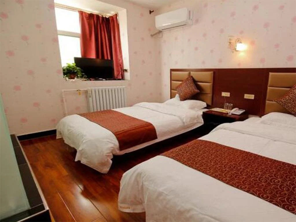 Konggang New City Keyiju Business Inn