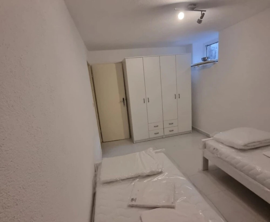 Four Bedroom apt w Patio Close to Beach and Center