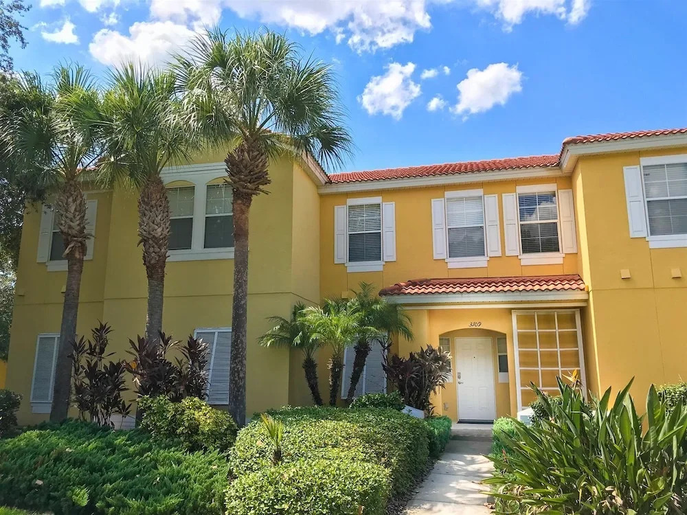 Private Screened Splash Pool Overlooking Tranquil Lake Right Beside Disney World by Florida Dream Homes
