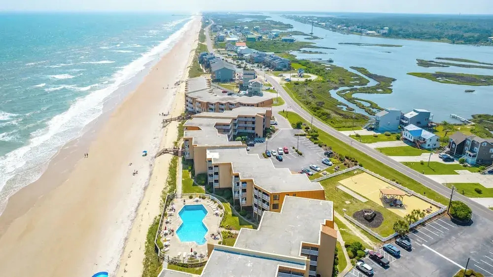 A Wave From It All by Topsail Realty