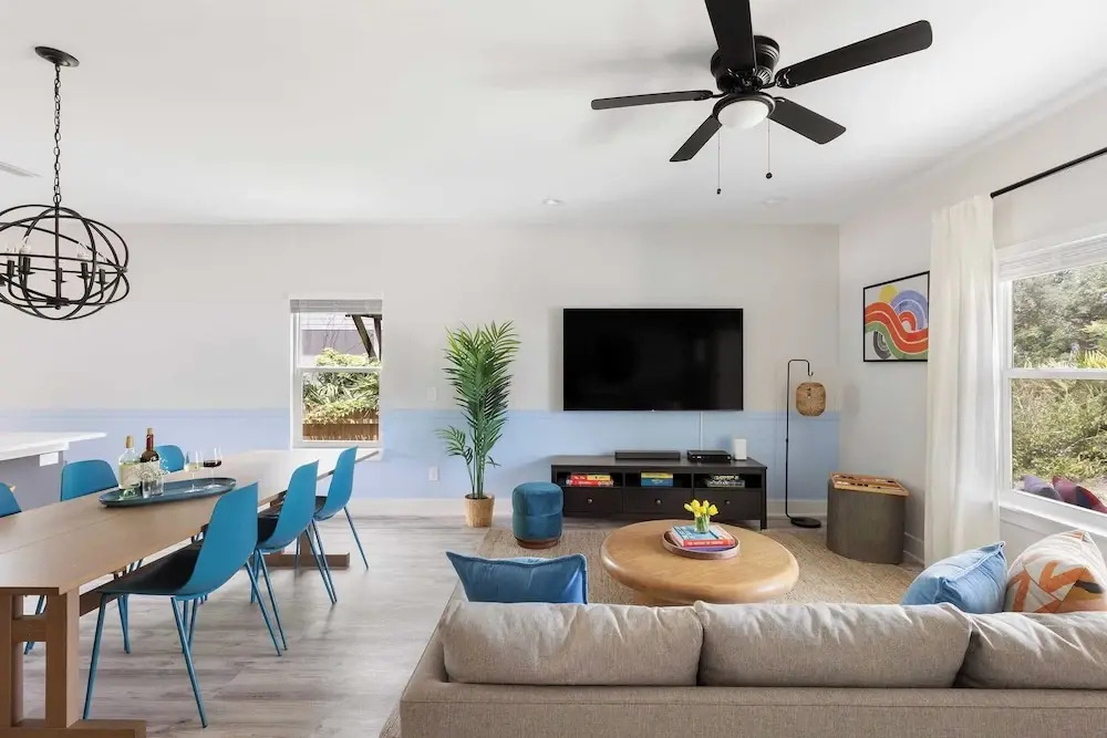 Playfully Designed Home + Hot Tub, Fire Pit & Game Room Blue Hour by Avantstay