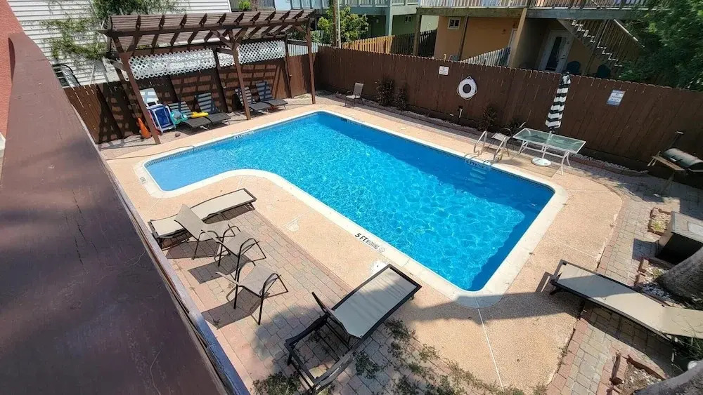 Cozy 2 bedroom Big Pool 75 yards to Beach 2 Bedroom Home by RedAwning