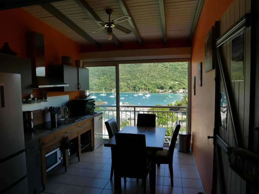 duplex, 2 bedrooms, 2 couples sea view overlooking the village of DESHAIES