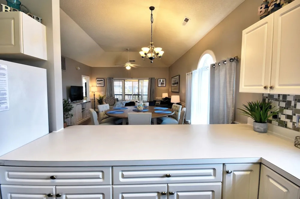 4703 Wild Iris Dr. 304 Magnolia Place 2 Bedroom Condo by Redawning