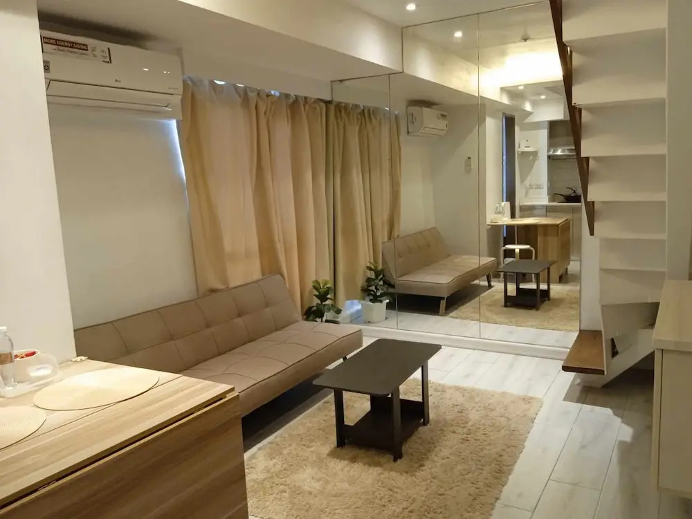 Cozi Modern Loft Suite near high street BGC wifi pool