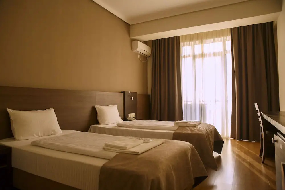 Olympus Hotel By Umbrella
