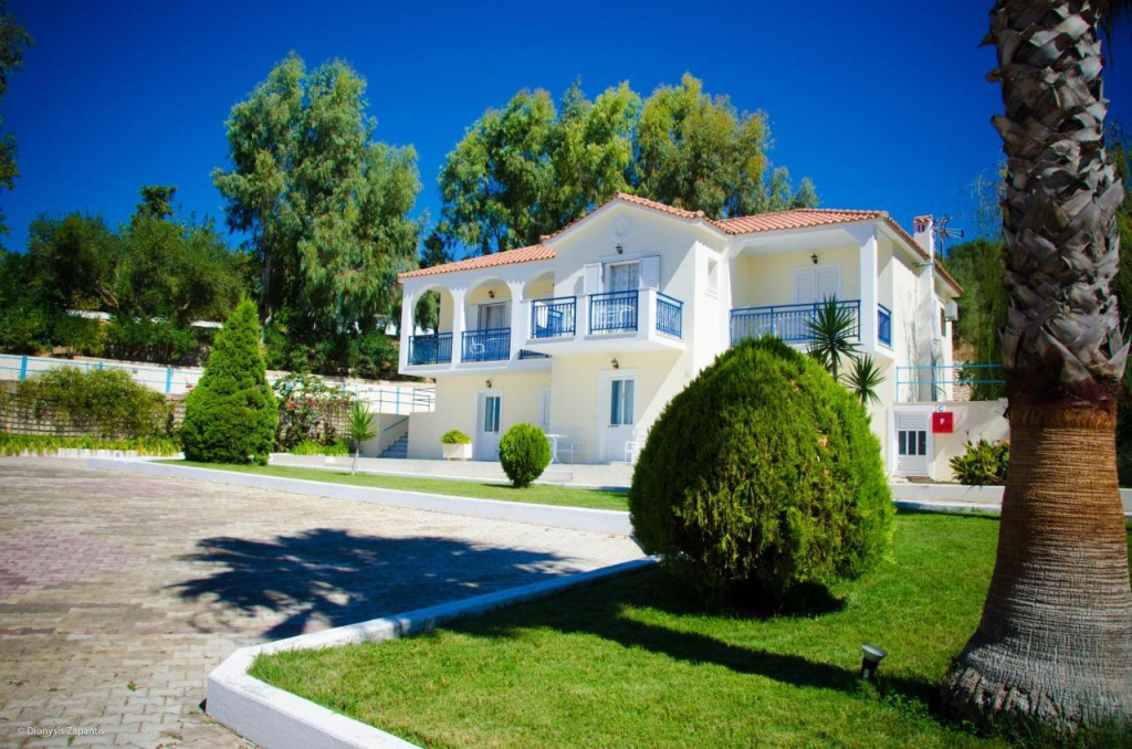 Отель Liberatos Village