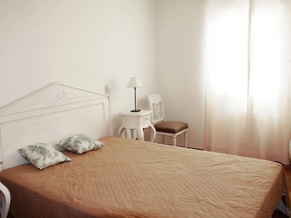 Semi-detached villa with dishwasher, close to the village