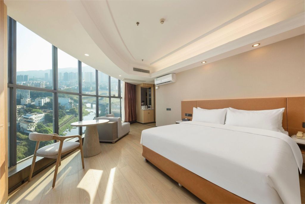 Vienna Hotel Shenzhen Pingshan Highway Station
