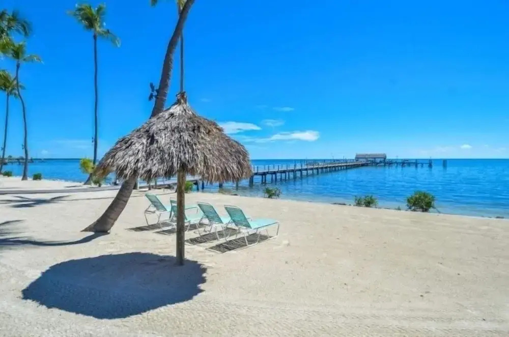 Direct Oceanfront With Private Staircase To Beach Prestigious Islamorada Condocomplex 2 Bedroom Condo by RedAwning