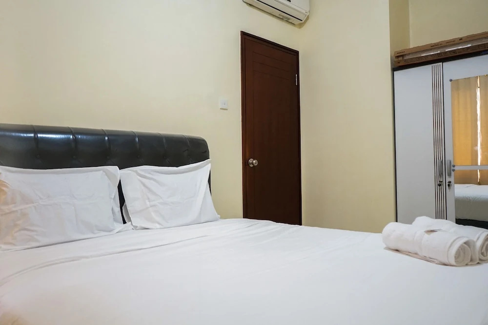 Minimalist 2BR Mediterania Marina Residences By Travelio