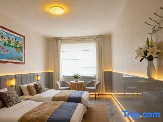 Xinjinlong Holiday Hotel (Linzhou Avenue Bus Station)