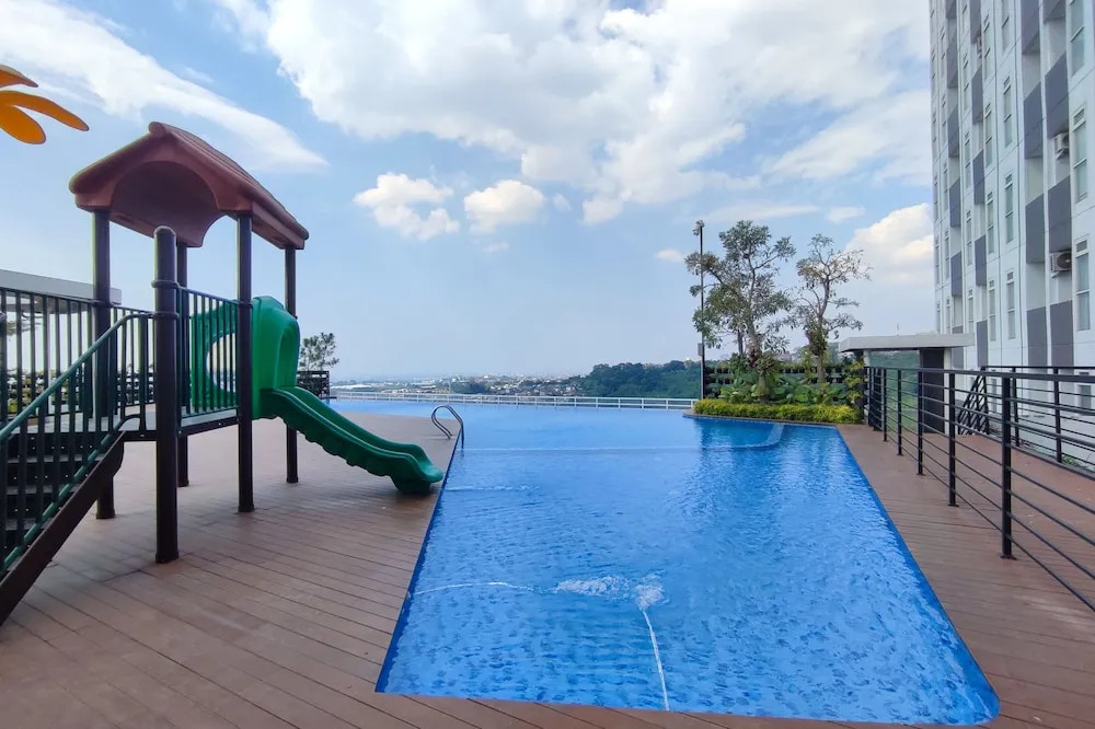 Homey 1BR without Living Room at Amartha View Apartment By Travelio