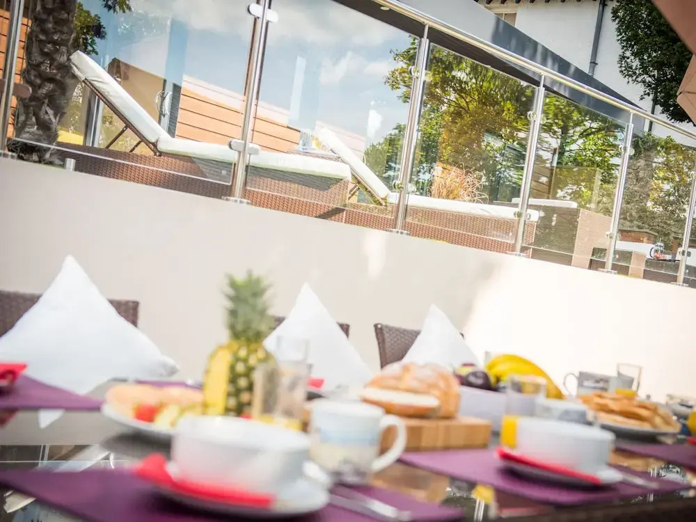 With two Terraces Overlooking the Town of Hythe and the sea in the Distance