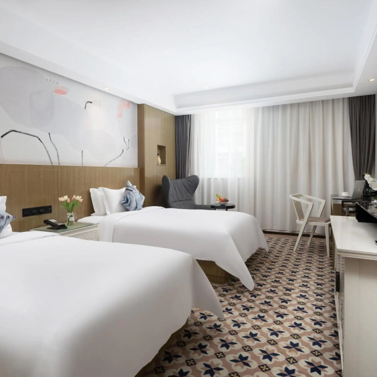 Paco Business Hotel - Longkou West