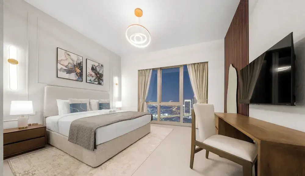 SML Vacation Homes - Sky High Apartments with Burj Khalifa and Dubai Fountain Views at Grande Signature, Downtown Dubai