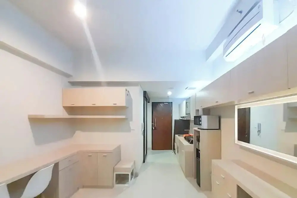 Best Homey and Modern Studio at Uttara The Icon Apartment By Travelio
