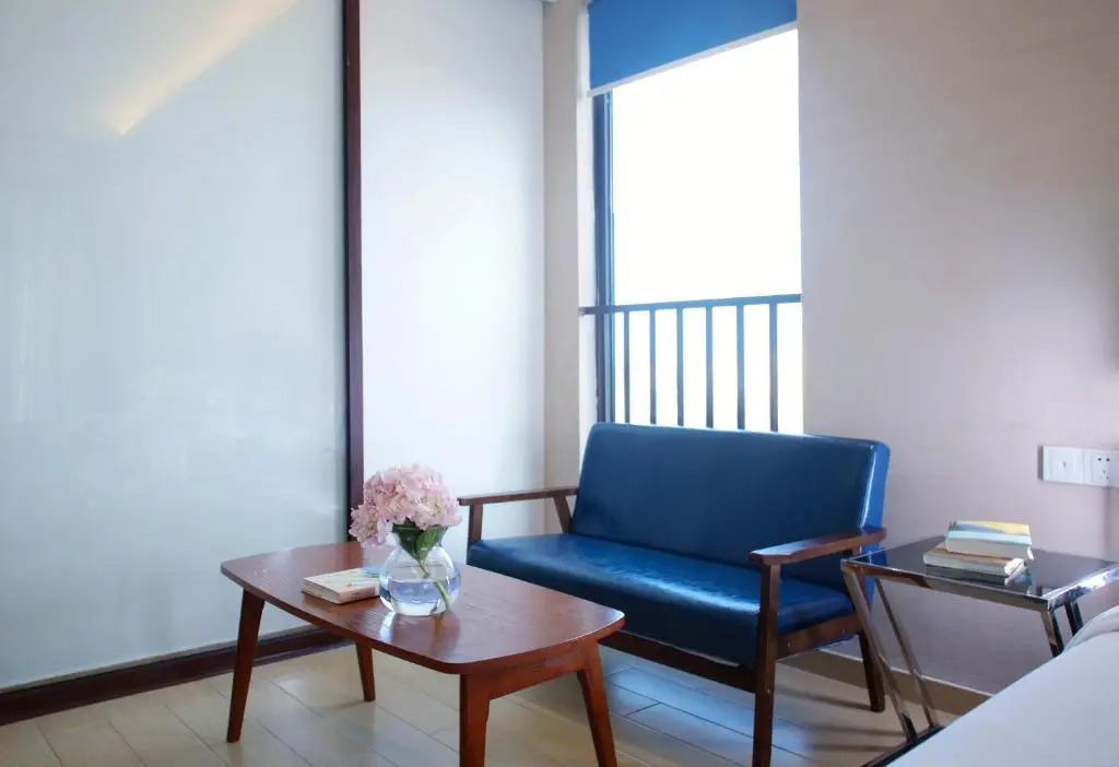 Green Collection Care Hotel (24 Hours Free Transfer from Meilan Airport/Railway Station)