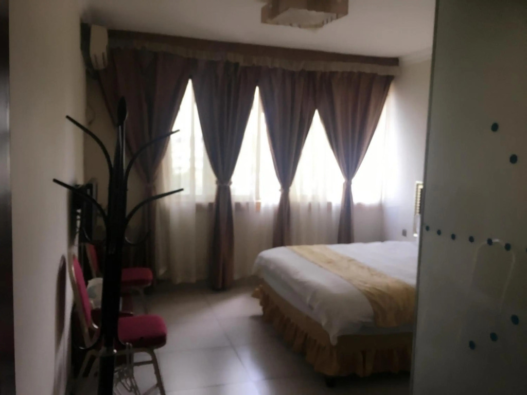 Shengtang Business Hotel