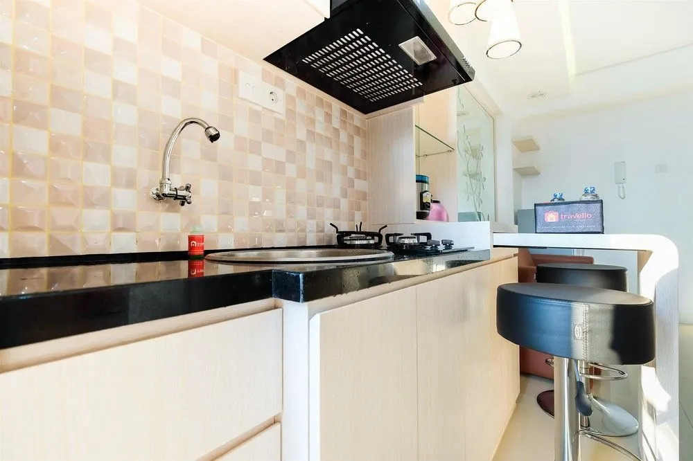 2 Bedrooms at Bassura City Apartment with Mall Access By Travelio