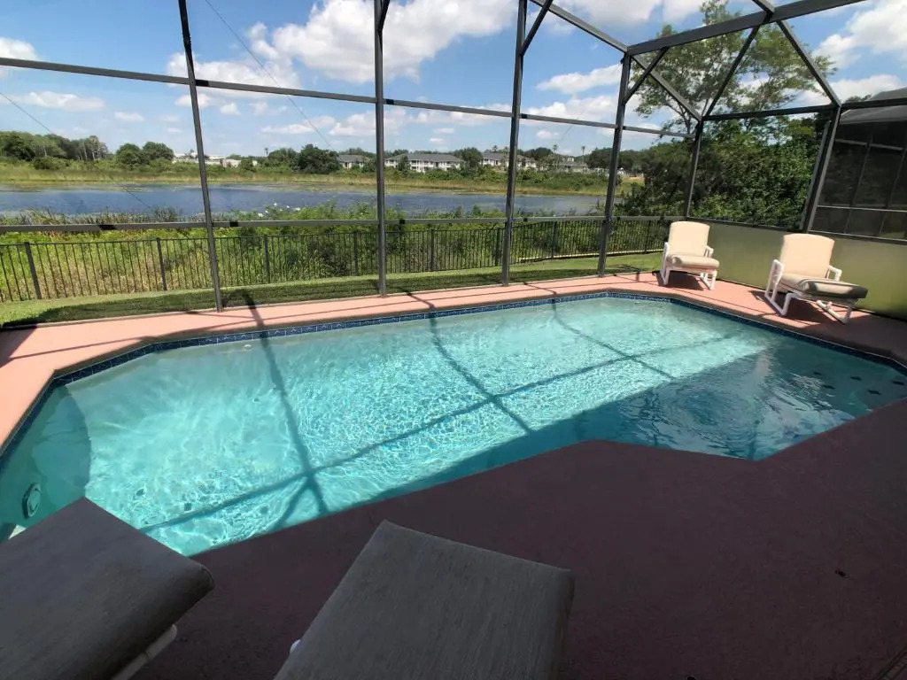 Pool, Patio, and Lake Views - 1122MCD