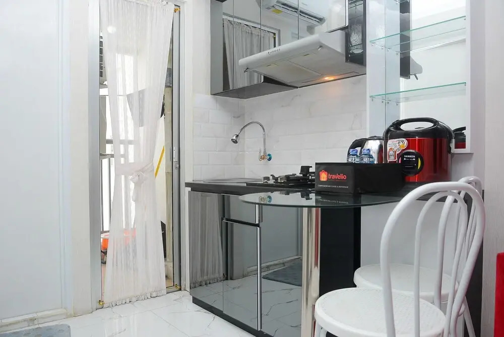 Tranquil and Comfy 2BR Bassura City Apartment near Mall By Travelio