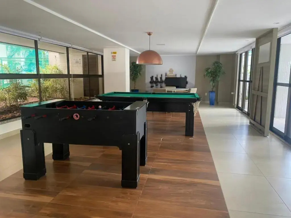 Apartamento a beira mar com piscina estilo resort