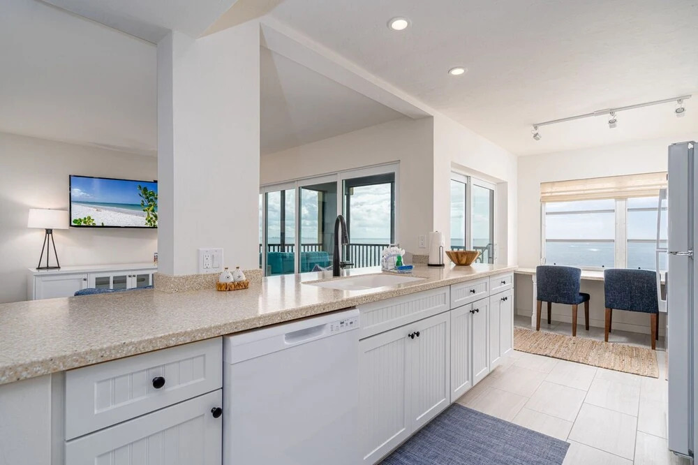 Estero Beach Club East #402 by Coastal Vacation Properties