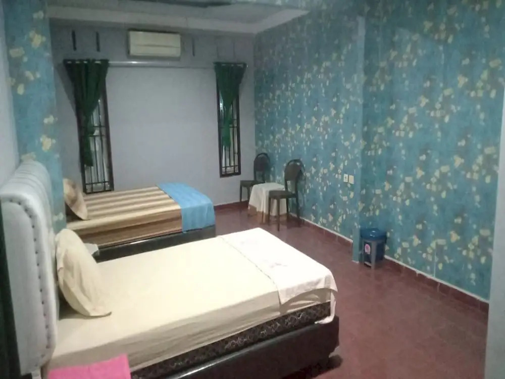 Hotel O Raudhatul Husna Homestay Syariah