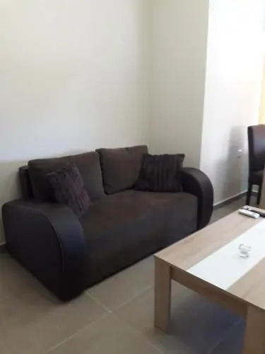 Plakoures Home