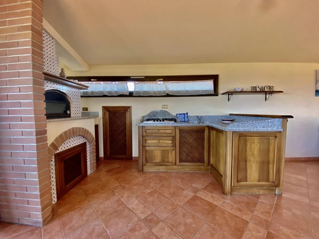 A few meters from the center of Capoliveri, attic penthouse with panoramic views-MANSARDA