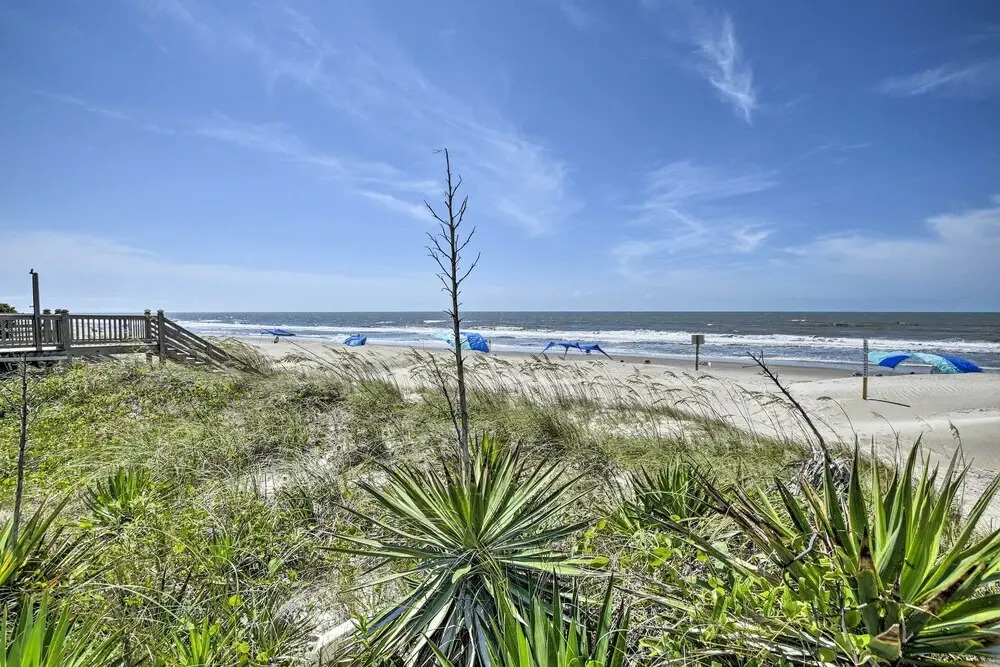Oak Island Beach Abode w/ Deck: Walk to Shore!