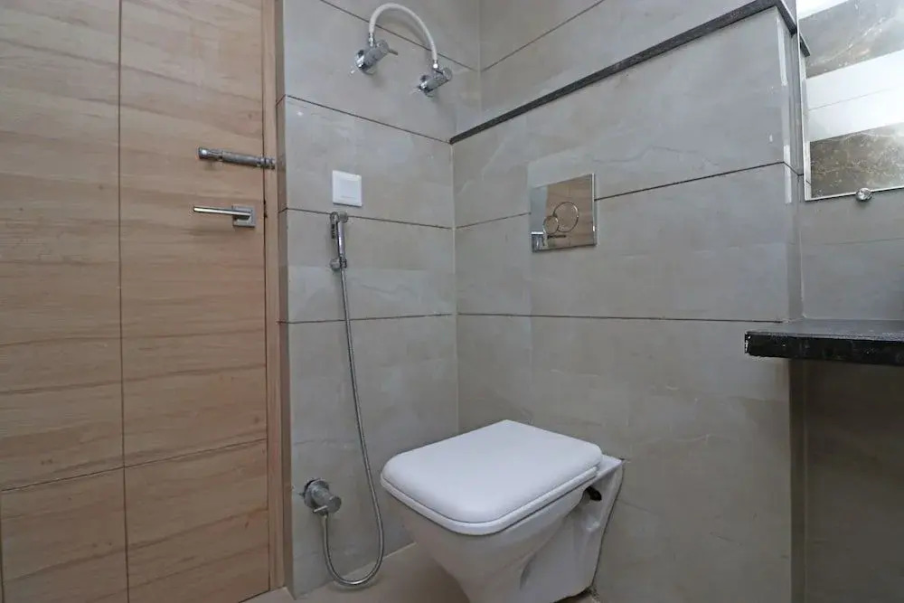 Capital O 30624 Hotel Triton