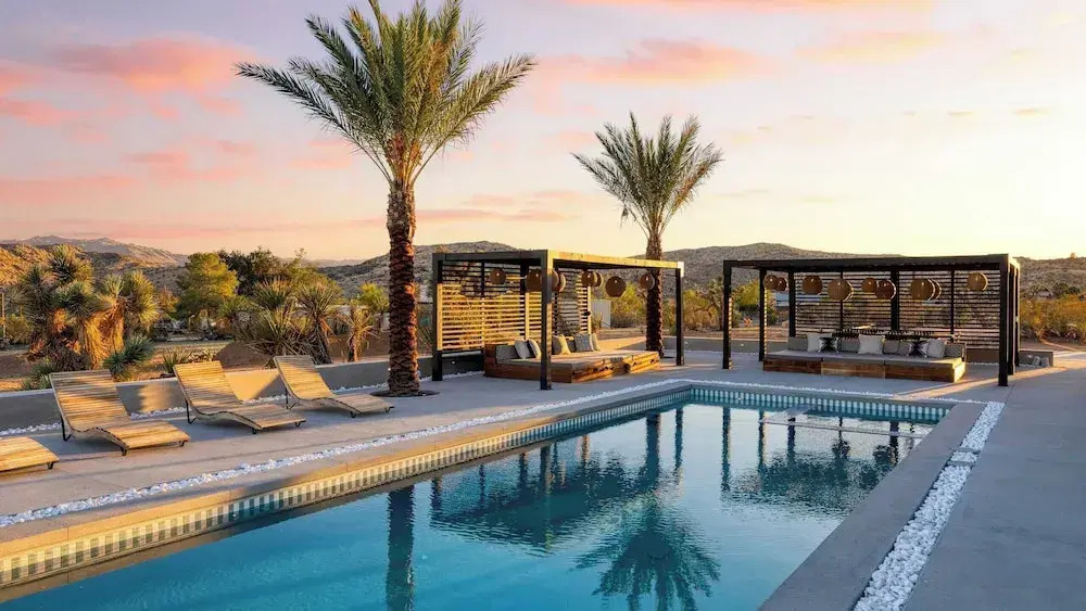 Iconic 6BR Desert Retreat w/ Pool, Pickleball & Fire Pit Joshua Tree Mansion by Avantstay